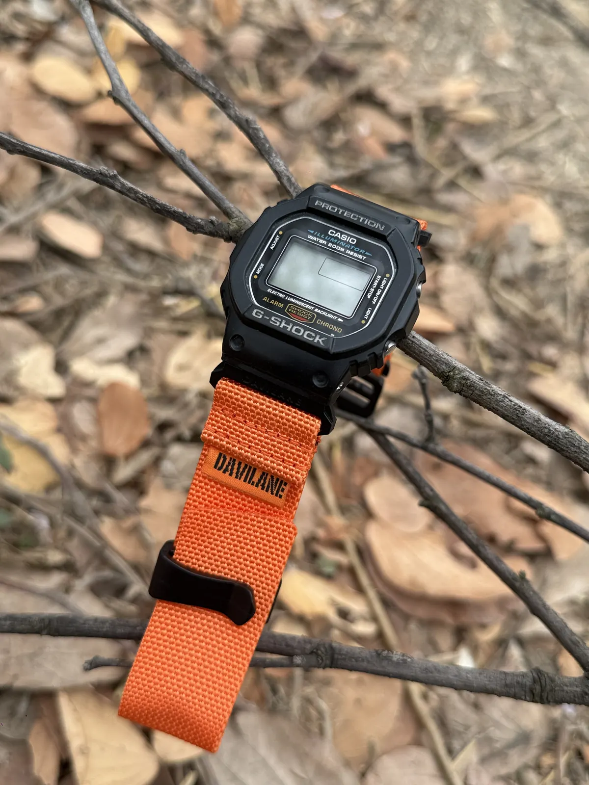 DAVILANE orange MOLLE nylon watch band installed on G-Shock DW-5600